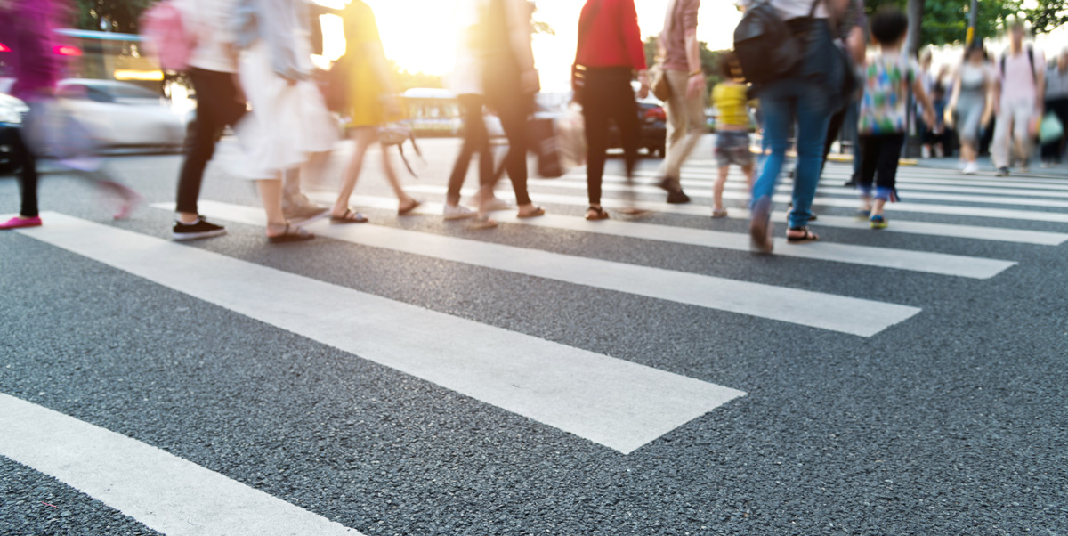 Group of people walking on the crosswalk